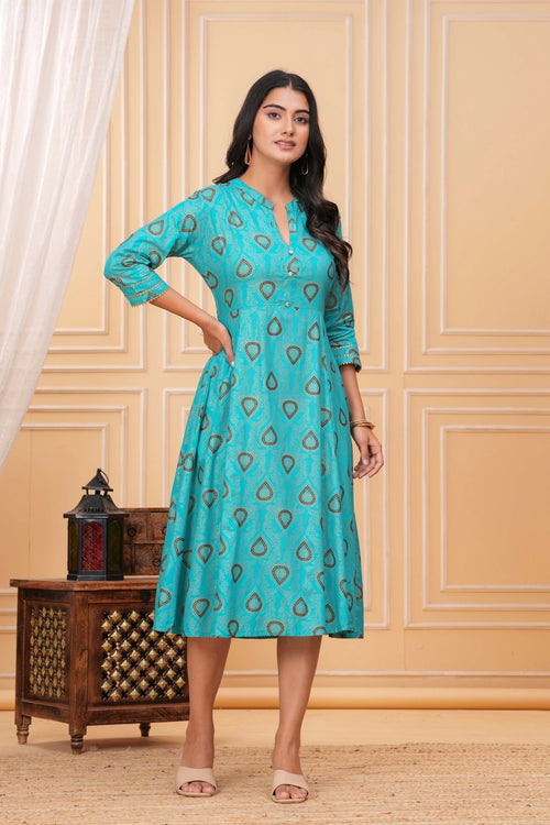 Teal A-line kurta dress with golden and brown block printed paisley patterns, mandarin collar