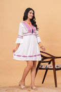 Black rayon kurti top with white floral and striped embroidery, white lace trim on sleeves