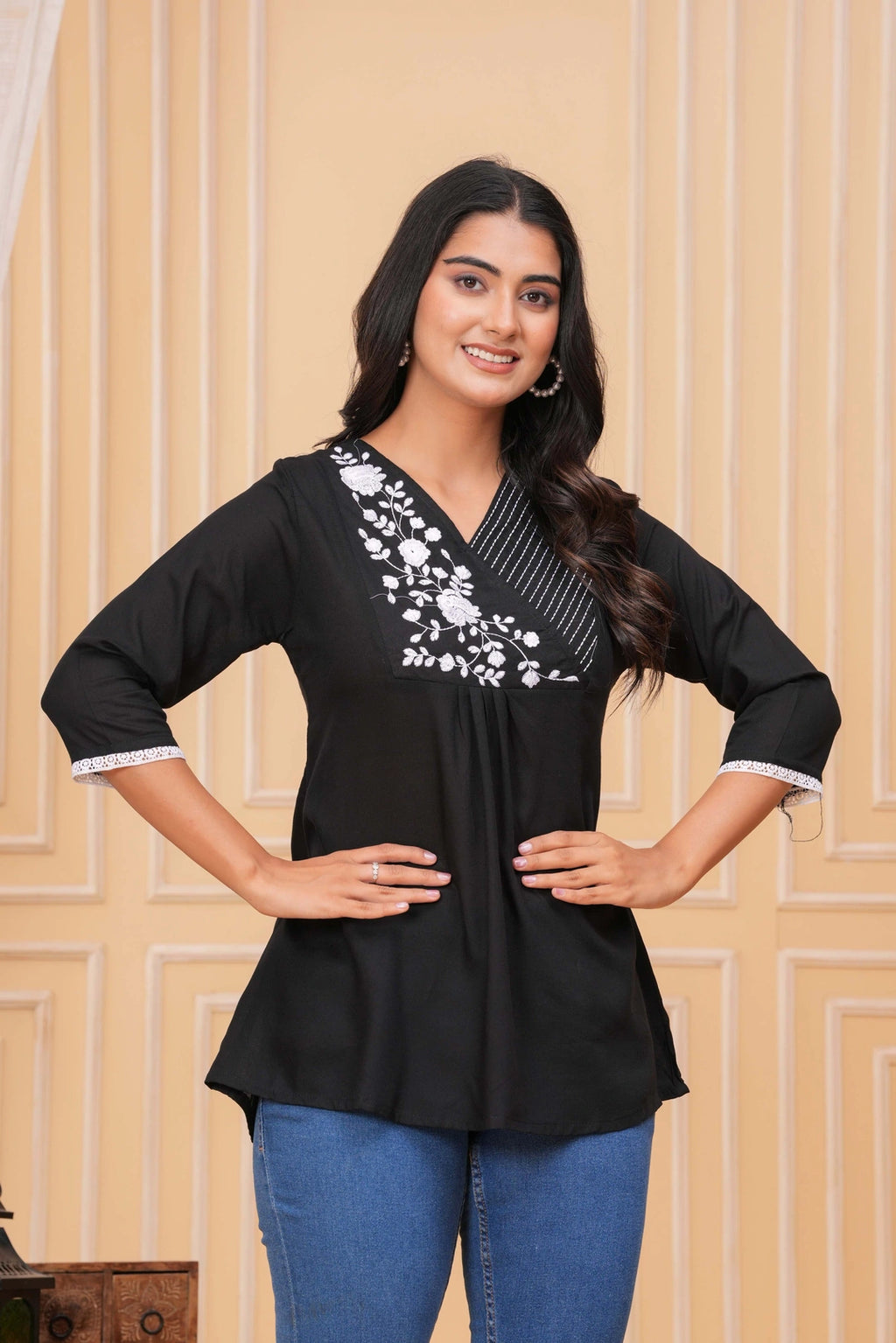 Navy Blue Cotton Flex kurta with white floral embroidery on the V-neck and white lace trim on three-quarter sleeves